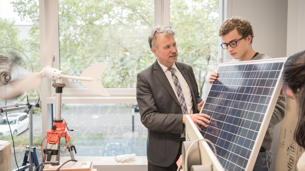 Professor teaching how solar panels work